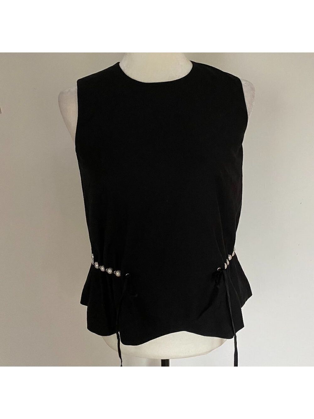 Black tank womens pearl bead accent peplum back zip fits like a small